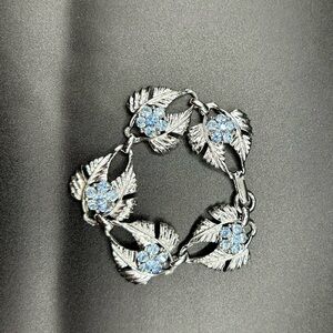 Vintage link bracelet silver-tone floral featuring blue rhinestones